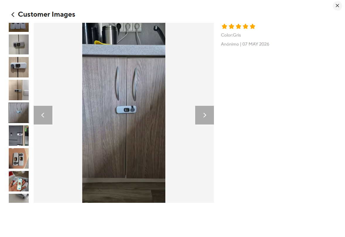 Cierre gris instalado en las puertas de un armario de madera, compartido por un comprador